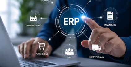 ERP consultant reviewing business operations on a laptop with a digital ERP software interface